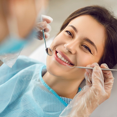 Woman smiling at the dentist’s office