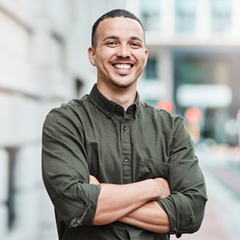 Man smiling after seeing a Delta Dental dentist in Louisville 